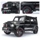 Коллекционная модель автомобиля Mercedes-Benz G63 Brabus 800 Black 1:24 на пьедестале