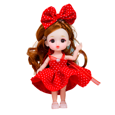 Doll in a red dress with polka dots and a big bow 15 cm