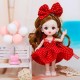 Doll in a red dress with polka dots and a big bow 15 cm