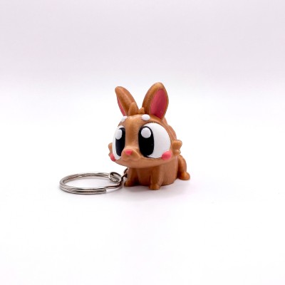 Великодній кролик брелок з яйцем Золотистий - 3D брелок-сюрприз