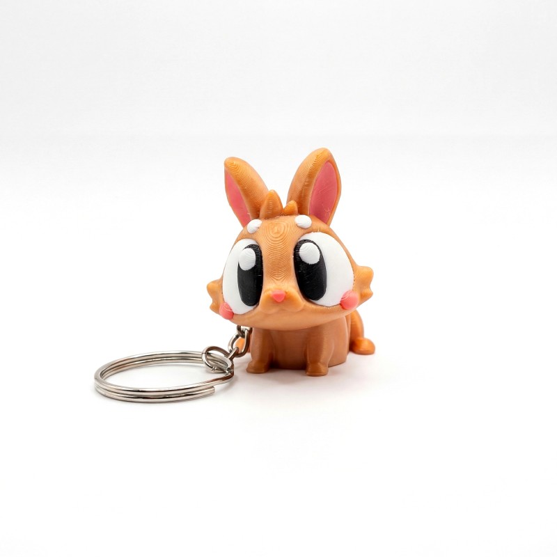 Великодній кролик брелок з яйцем Золотистий - 3D брелок-сюрприз