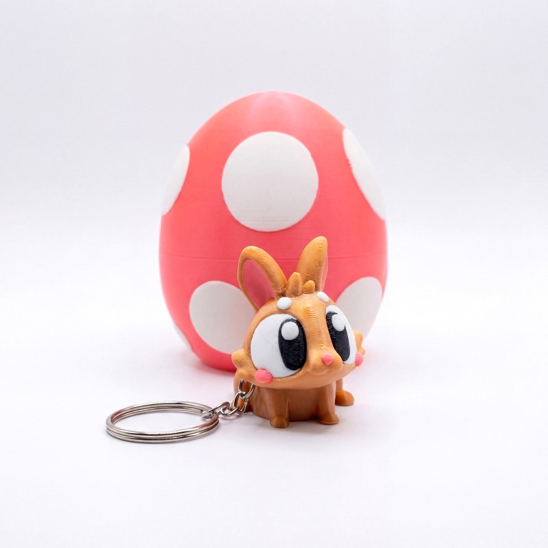Великодній кролик брелок з яйцем Золотистий - 3D брелок-сюрприз
