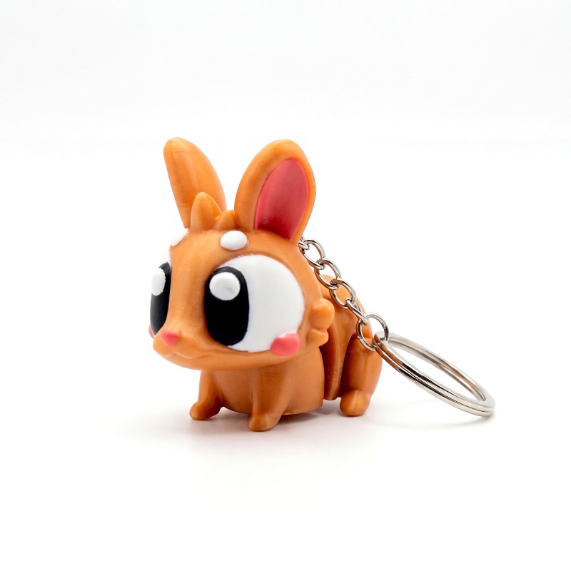 Великодній кролик брелок з яйцем Золотистий - 3D брелок-сюрприз