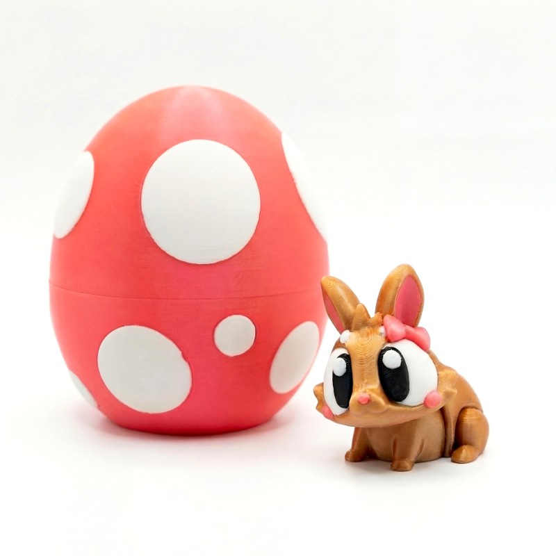 Easter Bunny with Egg Golden with Pink Bow - 3D Surprise Figurine Easter Bunny with Egg Golden with Pink Bow - 3D Surprise Figurine